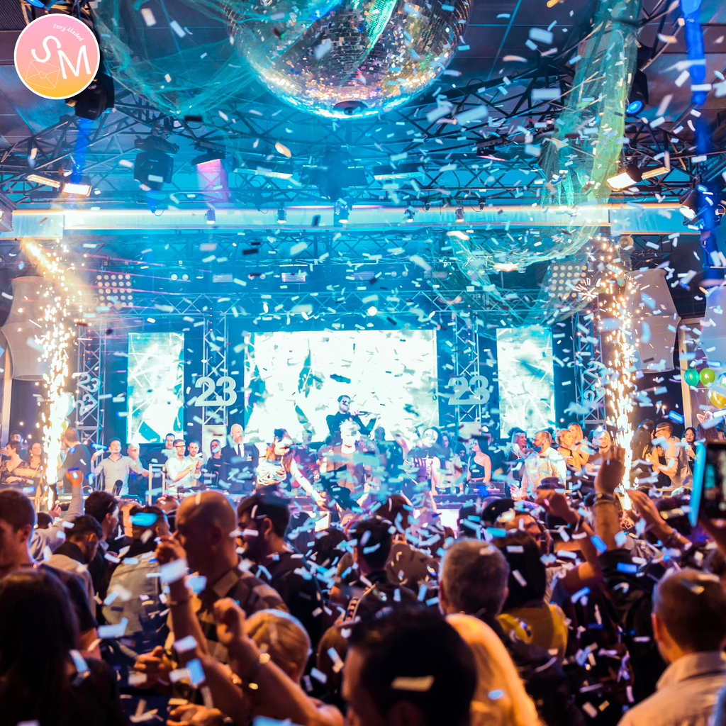 People celebrating with confetti and sparklers at a party or event. We Found Love in a Hopeless Place is a story told through personal letters about two people who meet by chance on an ordinary night and feel something neither of them planned for. Storymailed letters by mail